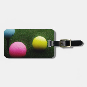 coloured golf balls and cart luggage tag
