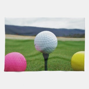 Coloured Golf Balls, mountain tee Tea Towel