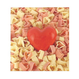 Coloured pasta in form of heart notepad