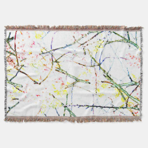 Colourful abstract floral design on white throw blanket