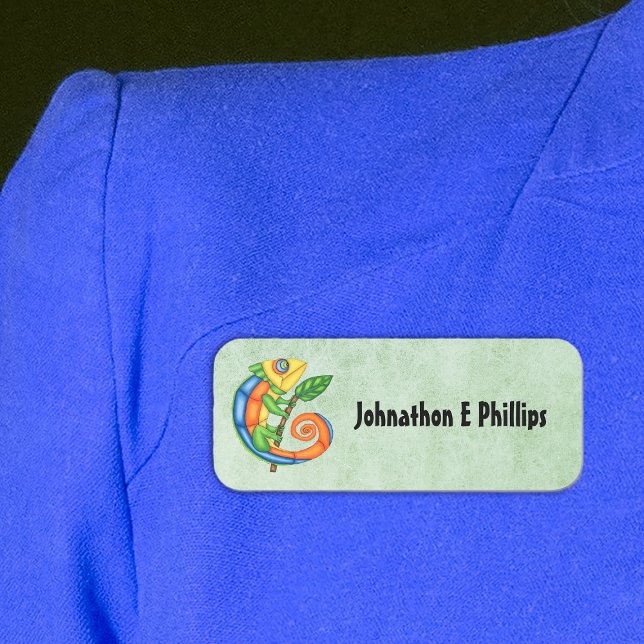Colourful Abstract Lizard Holding Leaf on Branch Name Tag (Colourful abstract lizard in multitude of colours leaf on stick on green plastic name tag.)