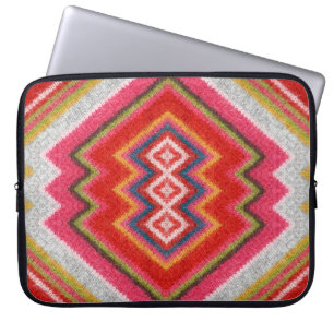 Colourful alpaca mohair sweater ornament closeup. laptop sleeve