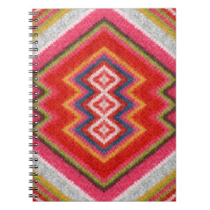 Colourful alpaca mohair sweater ornament closeup. notebook