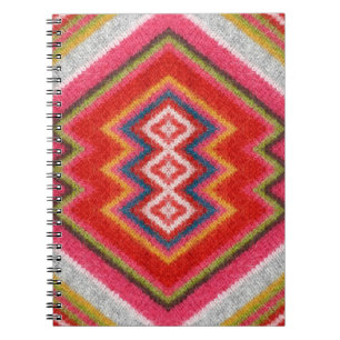 Colourful alpaca mohair sweater ornament closeup. notebook