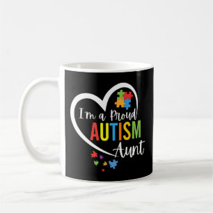 Colourful autism awareness puzzle pieces heart per coffee mug