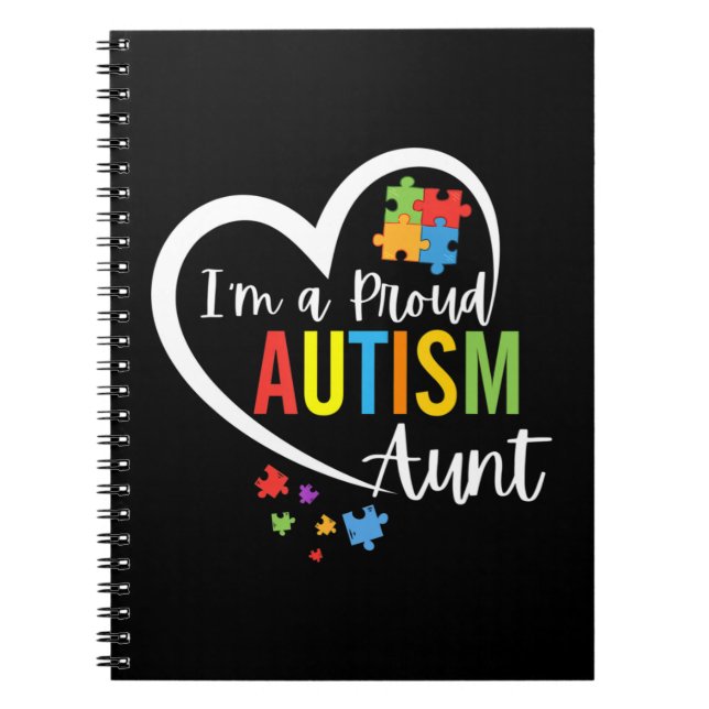 Colourful autism awareness puzzle pieces heart per notebook (Front)