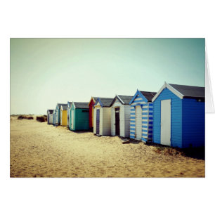 Colourful Beach Huts In The Sun
