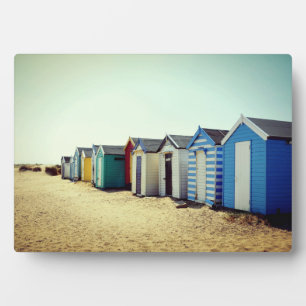 Colourful Beach Huts In The Sun Plaque