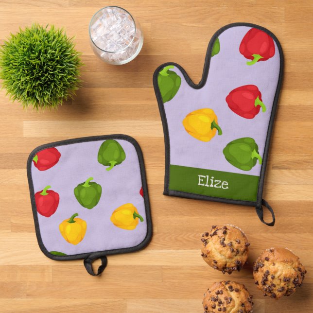 Colourful bell peppers on purple oven mitt & pot holder set (Top Down)