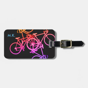colourful bikes on black luggage tag