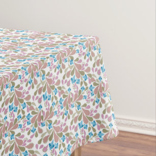 Colourful bouquets of retro flowers on white tablecloth