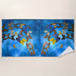Colourful Butterflies Flying over Blue Clouds Beach Towel