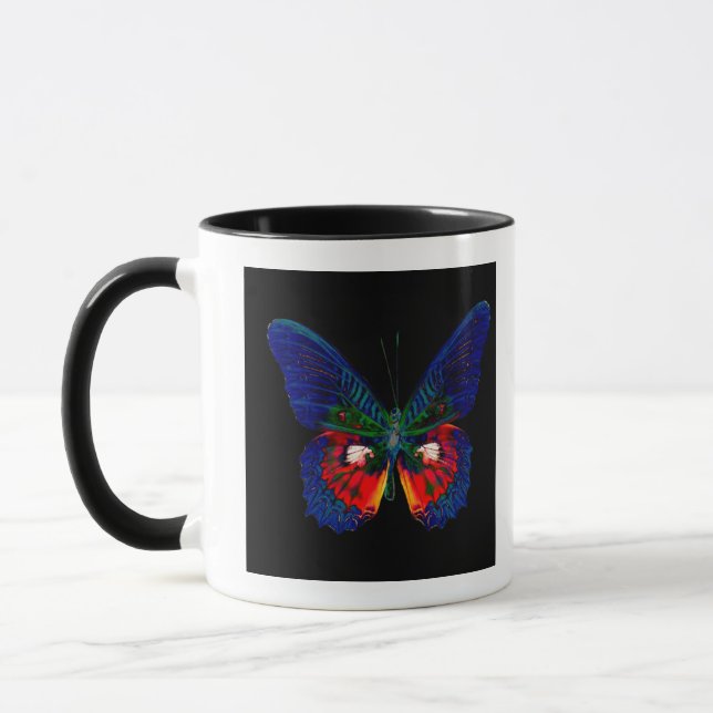 Colourful Butterfly design against black backdrop Mug (Left)