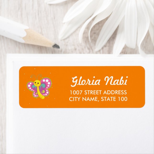 Colourful butterfly on orange return address label (Insitu)
