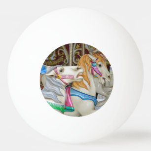 Colourful carousel horses ping pong ball