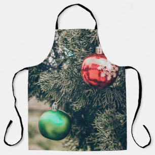 Colourful Christmas bauble decoration on a tree. V Apron