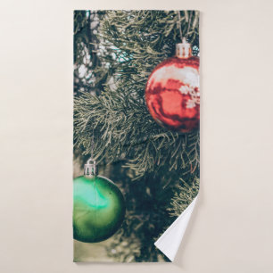 Colourful Christmas bauble decoration on a tree. V Bath Towel