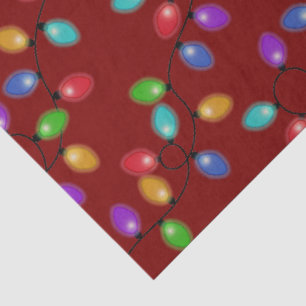 Colourful Christmas Lights On Red Tissue Paper
