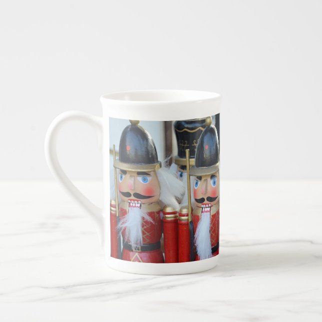 Colourful christmas nutcrackers bone china mug (Left)
