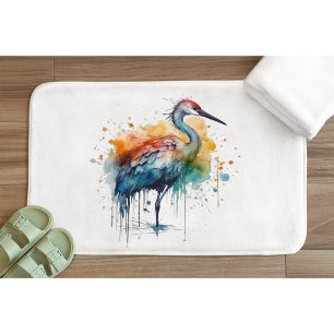 Colourful crane standing in the water bath mat
