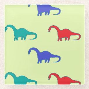 Colourful dino on green glass coaster
