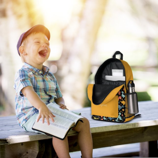 Colourful dinosaur pattern yellow black name  printed backpack (Creator Uploaded)