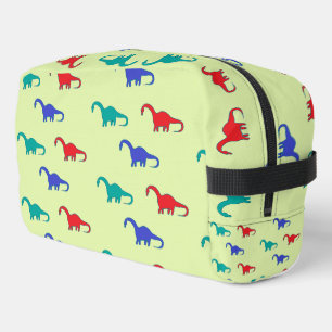 Colourful dinosaurs pattern on green dopp kit