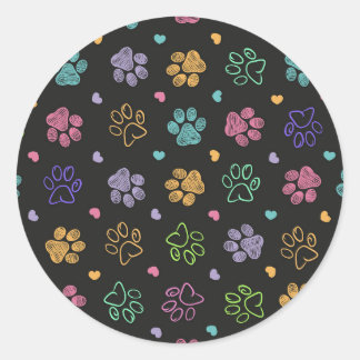 Colourful doodle paw prints classic round sticker