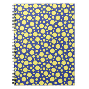 Colourful geometric yellow circles on blue notebook