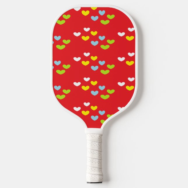 Colourful hearts on red pickleball paddle (Front)