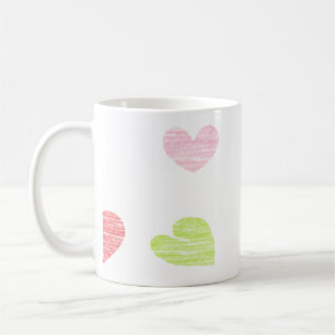 Colourful hearts on white coffee mug