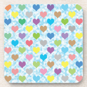 Colourful hearts pattern on blue background coaster