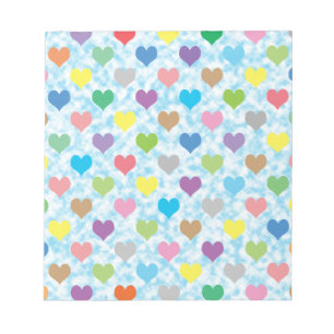 Colourful hearts pattern on blue background notepad