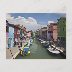 Colourful homes along canal on the island of postcard