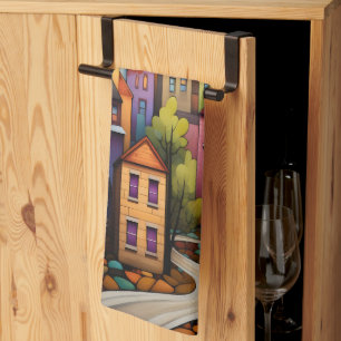 Colourful houses and trees in the fall tea towel