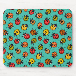 Colourful ladybugs on turquoise mouse pad