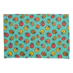 Colourful ladybugs on turquoise pillowcase