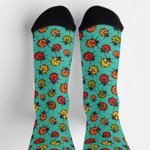 Colourful ladybugs on turquoise socks