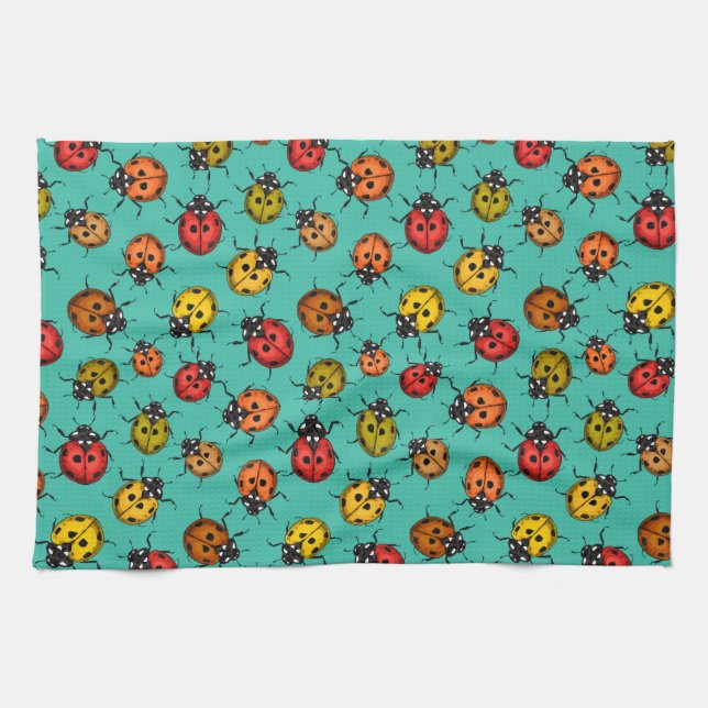 Colourful ladybugs on turquoise tea towel (Horizontal)