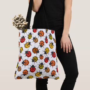 Colourful ladybugs on white tote bag