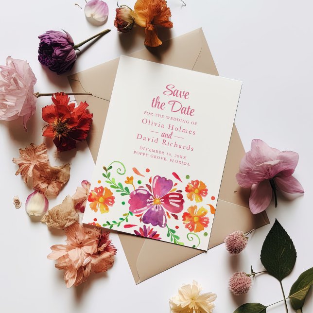 Colourful Mexican Floral Fiesta Save the Date Card (Colorful Mexican Floral Fiesta Save the Date Card on a table with colorful flowers.)