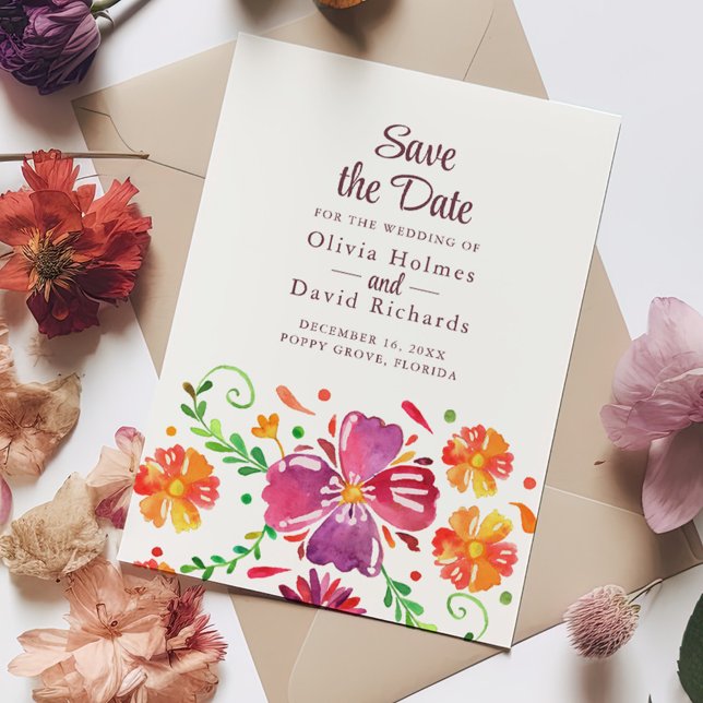 Colourful Mexican Floral Fiesta Save the Date Card (Colorful Mexican Floral Fiesta Save the Date Card on a table full with colorful flowers.)