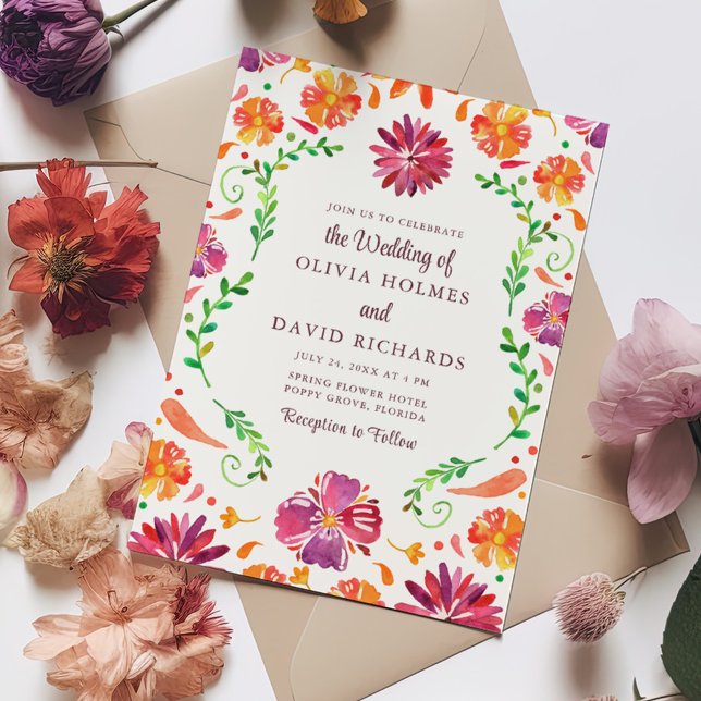 Colourful Mexican Floral Fiesta Wedding Invitation (Colorful Mexican Floral Fiesta Wedding Invitation on a table full with colorful flowers.)
