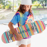 Colourful Modern Stripes Custom Personalised Name Skateboard<br><div class="desc">Colourful Modern Stripes Custom Personalised Name Skateboard features your personalised name in modern typography on a colourful striped background in pink, blue, orange and white. Personalise by editing the text in the text box provided. Give a custom made gift, personalised skateboard to your favourite skateboarder for Christmas, birthday or your...</div>