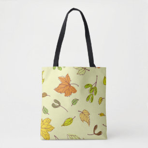 Colourful outline maple leaves in yellow backgroun tote bag