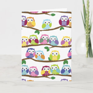 Colourful owls on a branch card