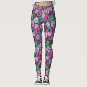 Colourful pansies on dark greenish blue leggings