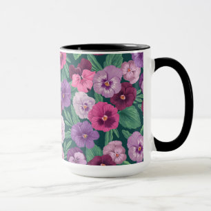 Colourful pansies on dark greenish blue mug