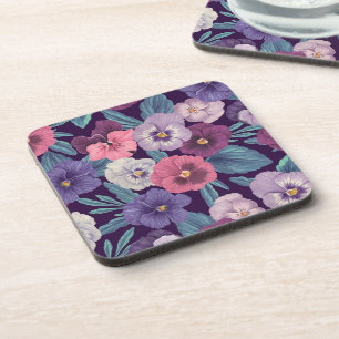 Colourful pansies on deep violet coaster
