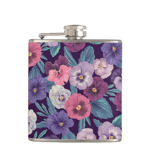 Colourful pansies on deep violet hip flask